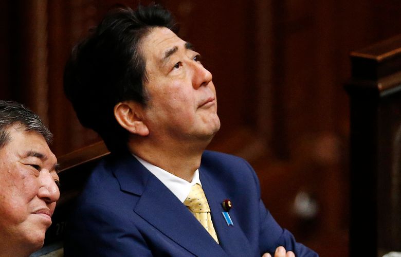 Japanese Prime Minister Shinzo Abe, looks up during a plenary session at the lower house in Tokyo, Thursday, July 16, 2015. (AP Photo/Shuji Kajiyama)