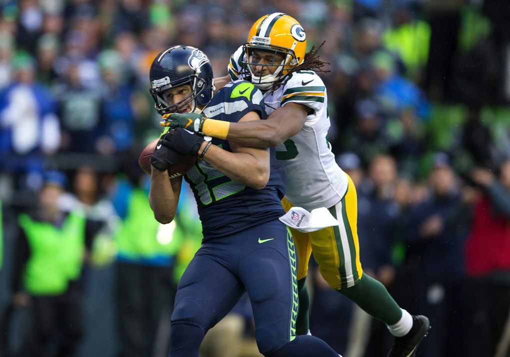 Seahawks wide receiver Jermaine Kearse makes game winning touchdown catch as Packers corner back Tramon Williams can’t stop the score during overtime of NFC Championship game, Sunday, Jan. (Mike Siegel / The Seattle Times)