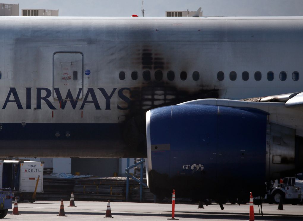 A British Airways 777 sits at the Las Vegas airport after an engine on the London-bound jet caught fire before takeoff last month. (John Locher / The Associated Press)