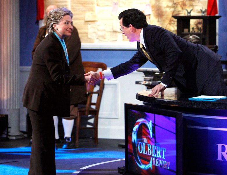 FILE – In this Thursday, April 17, 2008, file photo, Democratic presidential hopeful Sen. Hillary Rodham Clinton, D-N.Y., greets Stephen Colbert as she makes an appearance at a taping of Comedy Central’s “The Colbert Report,” in Philadelphia. (AP Photo/Charles Dharapak, File)