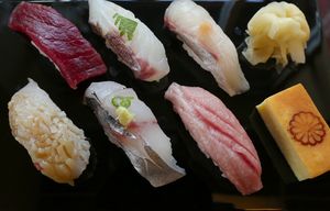 At sushi chef Kotaro Kumitaâ€™s new restaurant, Wataru, a selection of sushi is displayed, top row, from left: big eye tuna, red snapper and yellow jack (ginger at top right).