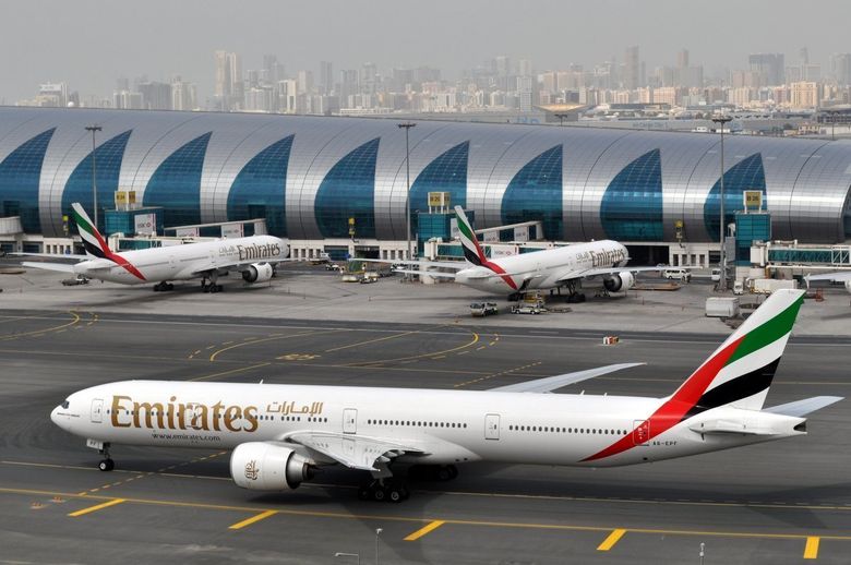 Hasil gambar untuk Emirates to Let Travelers Keep Laptops, Tablets Until Boarding