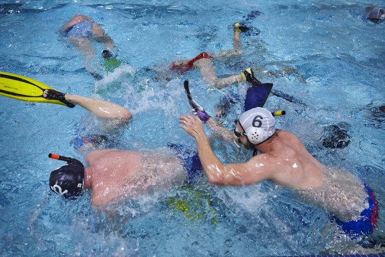 The action is at the bottom of the pool in underwater hockey | The ...