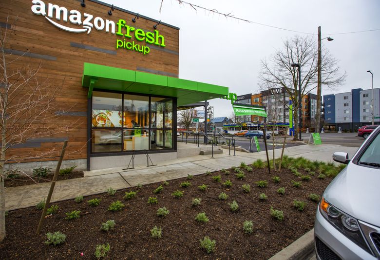 Amazon’s grocery pickup site at 5100 15th Ave. N.W. in Ballard, where Prime members can have groceries they ordered online delivered to their vehicle. The second pickup site is in Sodo.  (Mike Siegel / The Seattle Times)