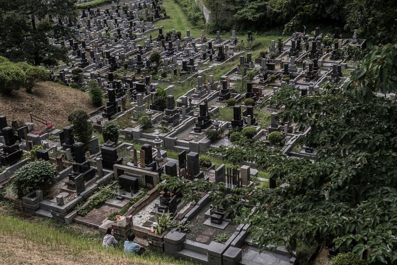A cemetery outside Tokyo. Nearly all people who die in Japan are cremated. Crematories cannot keep up with demand, so businesses are combining hospitality for families and temporary storage for bodies. (BEN C. SOLOMON/NYT)