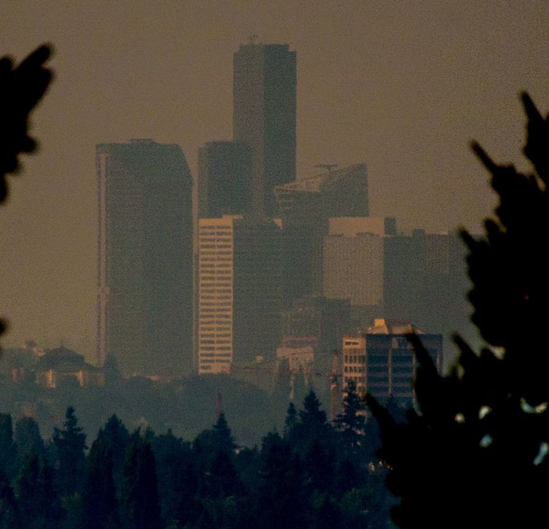 The Washington State Department of Ecology has issued an air-quality alert for several counties as smoke from British Columbia wildfires began moving south. Here, downtown Seattle is nearly obstructed by the smoky haze on Wednesday last week. (Mike Siegel / The Seattle Times)