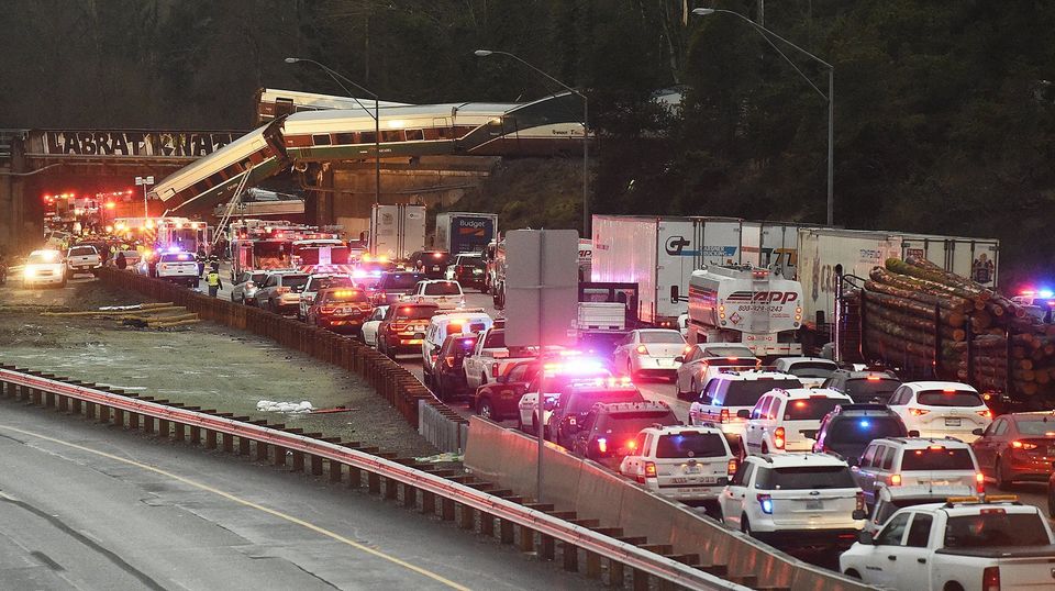 Emergency responders arrive en masse to the Monday morning detrainment of an Amtrak passenger train in the Nisqually area.  Photograph: Steve Bloom/The Olympian.