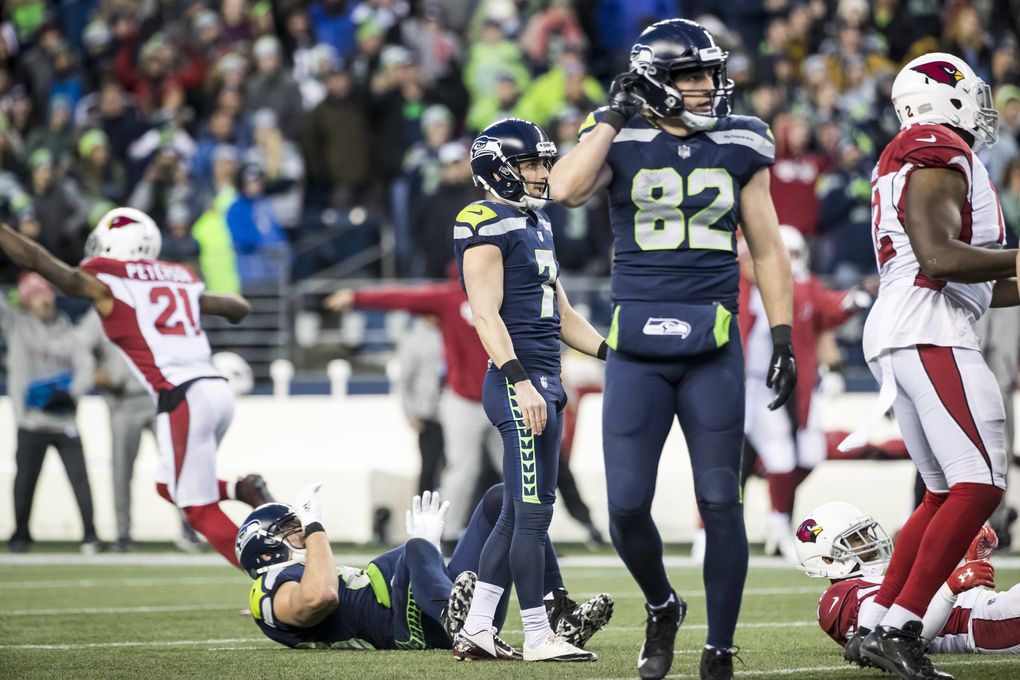 Seahawks kicker Blair Walsh watches his final field goal attempt miss, as the Seattle Seahawks lose 26-24 to the Arizona Cardinals at CenturyLink Field in Seattle. (Bettina Hansen / The Seattle Times)