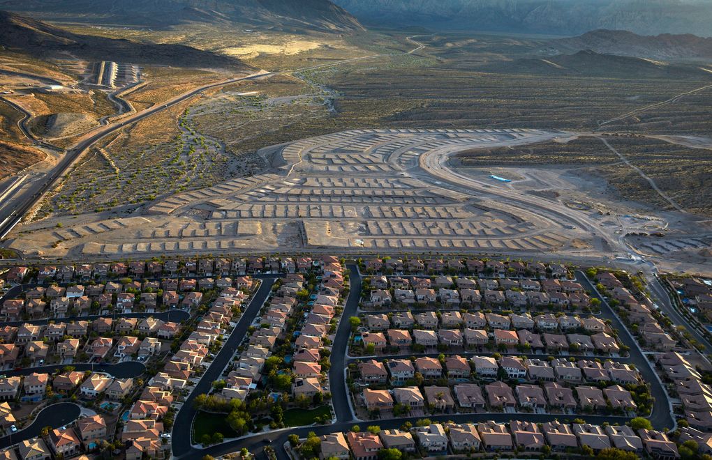 GLOOM (Las Vegas): Housing lots sit empty along the western edge of Las Vegas. Some cities are still struggling to shed the scars of recession. Families there earn nearly 20 percent less, adjusted for inflation, than in 2007. (John Locher/The Associated Press)