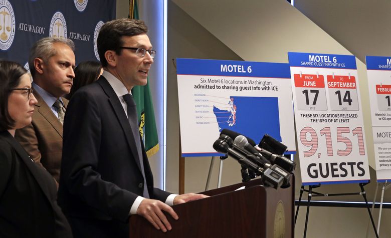 Washington state Attorney General Bob Ferguson announces the state is suing Motel 6, alleging the budget hotel illegally disclosed the personal information of thousands of guests to immigration authorities. (Elaine Thompson / The Associated Press)