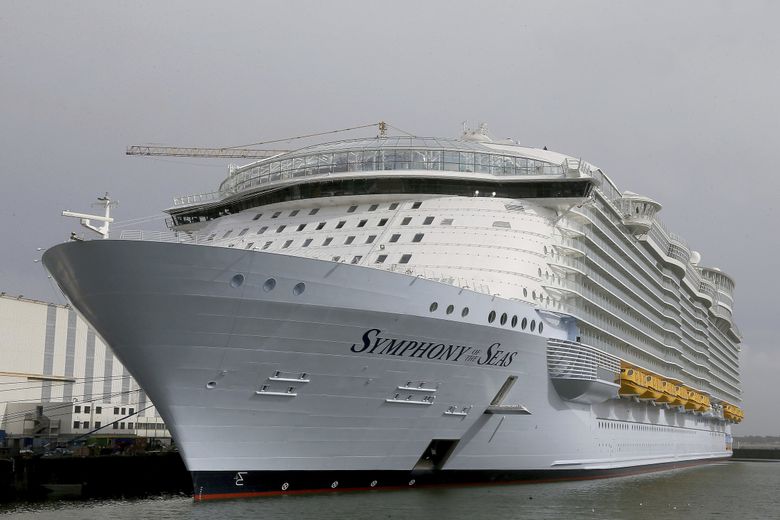 Cruise line Royal Caribbean promised to reimburse a couple’s hotel room after a medical emergency disrupted their cruise. Here, a different Royal Caribbean ship docks at Saint Nazaire port in France.(David Vincent / AP)