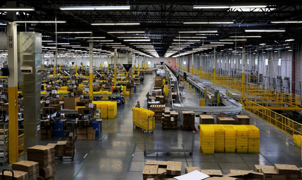 The multilevel Kent warehouse covers more than 850,000 square feet. Much of the work is highly automated. (Alan Berner / The Seattle Times)