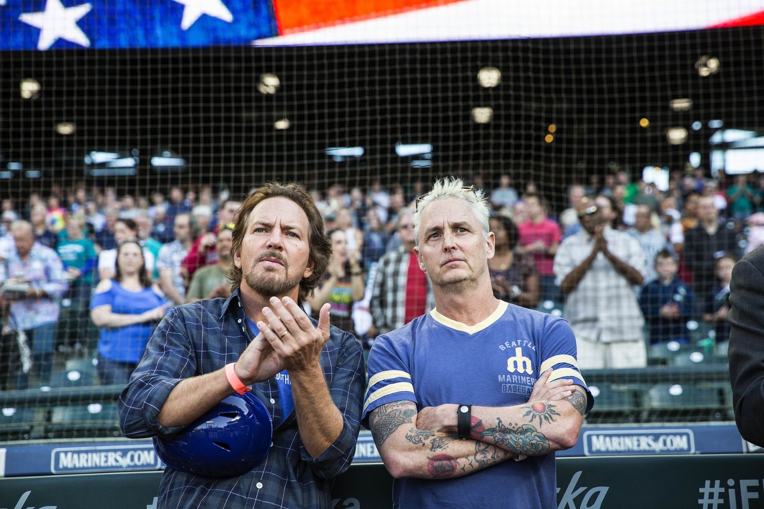 Pearl Jams Eddie Vedder left and Mike McCready attending a Mariners game last month will return to Safeco Field for a pair of concerts Aug 8 and 10 that will benefit organizations serving people experiencing homelessness Dean Rutz  The Seattle Times