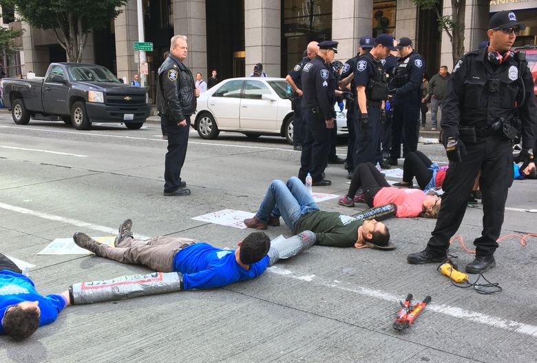 Facing Sleeping Dragon Seattle Cracks Down On Protesters Who Block Traffic The Seattle Times
