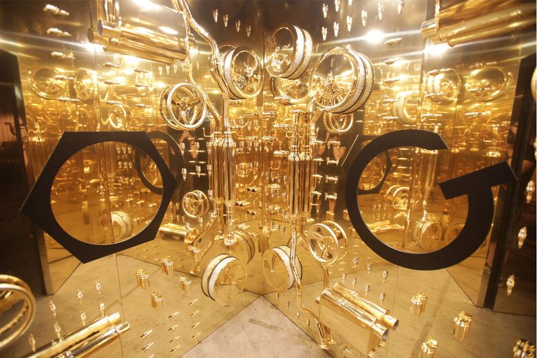 Cartier pop-up — in a gold shipping 