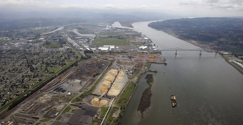 This May 12, 2005, file photo, shows the port of Longview on the Columbia River at Longview, Washington. A judge says Washington state's Department of Natural Resources acted arbitrarily when it blocked a sublease sought by developers of a proposed coal-export terminal near Longview. — Photograph: Elaine Thompson/Associated Press.