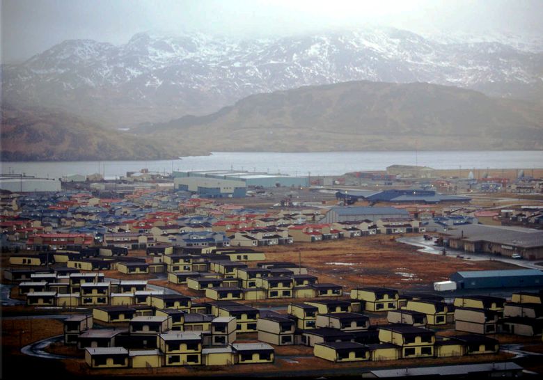 In this February 1997 file photo, hundreds of houses, which over 6,000 military personnel and dependents called home, along with schools, warehouses, hangars, and other structures sit empty on the Adak Naval Air Facility in Alaska, which closed that year. — Photograph: Al Grillo/Associated Press.
