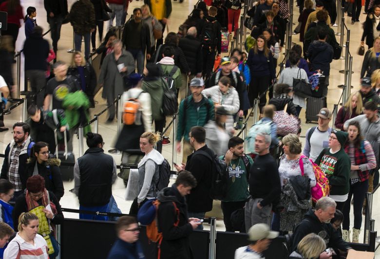 Seattle-Tacoma International Airport is testing a plan to allow nontravelers to once again access passenger-only areas that lie beyond the security checkpoints.
  (Ellen M. Banner / The Seattle Times)