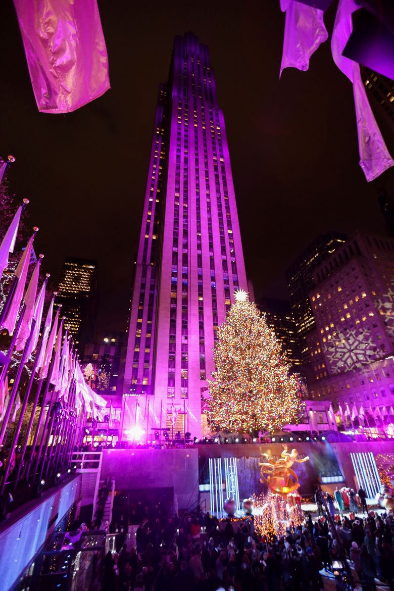 Sprucing up NYC: Rockefeller Center lights Christmas tree | The Seattle Times
