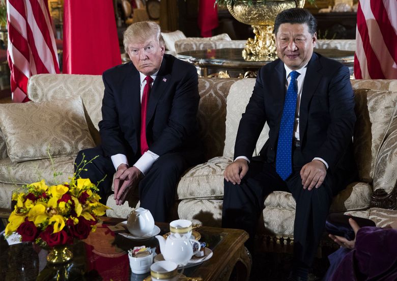 President Donald J. Trump met with Chinese President Xi Jinping at Trump's Mar-a-Lago resort in Palm Beach last year. Xi is holding China up as a protector of the world order in the face of new American isolationism. — Photograph: Doug Mills/The New York Times.