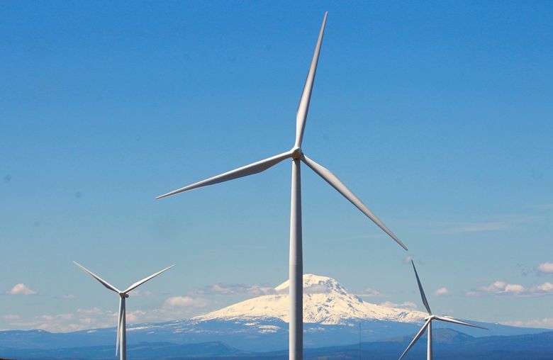 Wind turbines stand along the Columbia River Gorge near Goldendale, Wash. (Rick Bowmer / AP, File)