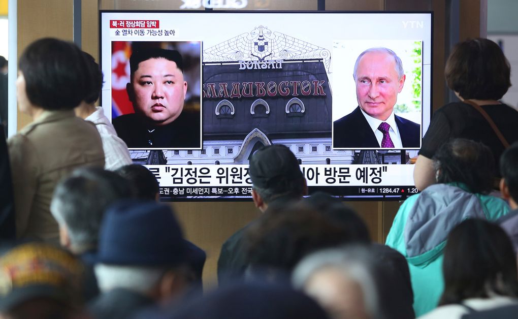 People watch a TV screen showing images of North Korean leader Kim Jong Un, left, and Russian President Vladimir Putin, right, during a news program at the Seoul Railway Station in Seoul, South Korea, on Tuesday, April 23, 2019. North Korea confirmed on Tuesday that Kim will soon visit Russia to meet with Putin in a summit that comes at a crucial moment for tenuous diplomacy meant to rid the North of its nuclear arsenal. The Korean letters on the screen read: “Kim Jong Un plans to visit Russia”. — Photograph: Ahn Young-joon/Associated Press.