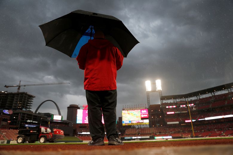 Reds-Cardinals game postponed by rain; doubleheader Aug. 31 | The Seattle Times
