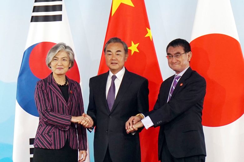 China Hosts Japan S Korea Ministers In Bid To Smooth Row