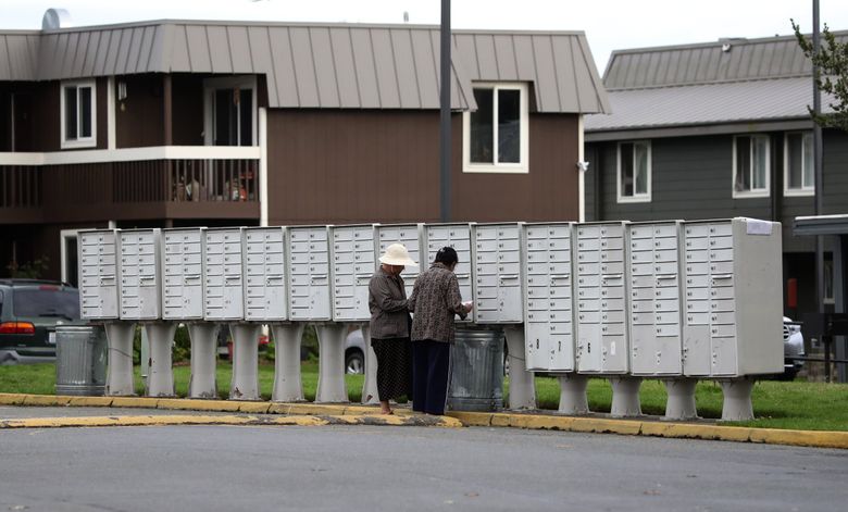 A mailbox installation reflects the number of units at Kirkland Heights Apartments in Kirkland. Microsoft announced a $245 million loan for King County Housing Authority to acquire five apartment complexes so that the residents can have stabilized rent. (Ken Lambert / The Seattle Times)