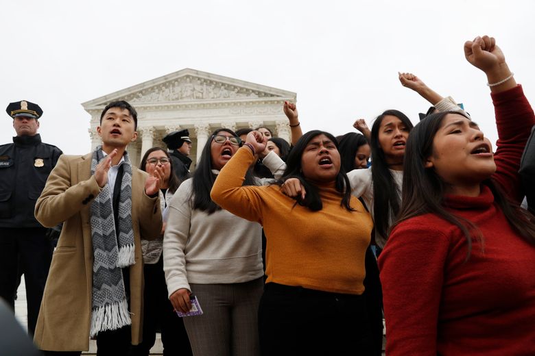 DACA recipients and others leave the Supreme Court with their hands in the air after oral arguments were heard in the case of President Trump’s decision to end the Obama-era, Deferred Action for Childhood Arrivals program (DACA), Tuesday, Nov. 12, 2019, at the Supreme Court in Washington. (AP Photo/Jacquelyn Martin)
