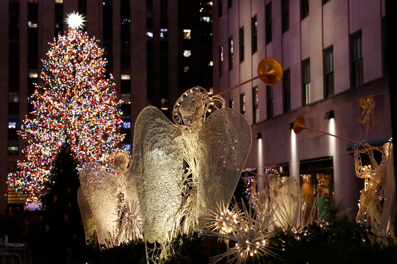 ‘Tis the season: Rockefeller Center Christmas tree lights up | The Seattle Times