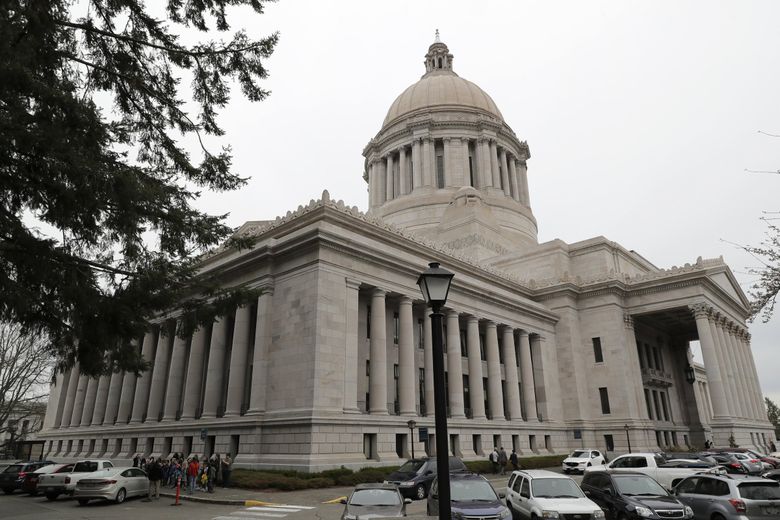 Backfilling financial losses from Initiative 976 will likely dominate transportation debates in the state House and Senate for much of the 60-day legislative session. (Ted S. Warren / The Associated Press)