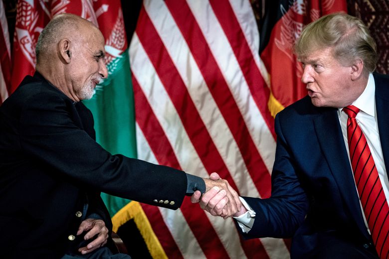 President Ashraf Ghani of Afghanistan and President Donald Trump meet at Bagram Air Field in Kabul, Afghanistan in November 2019. Three successive U.S. presidents —George W. Bush, Barack Obama and now Donald Trump — have promised victory in Afghanistan, even if they each defined it differently. (Erin Schaff / The New York Times file)