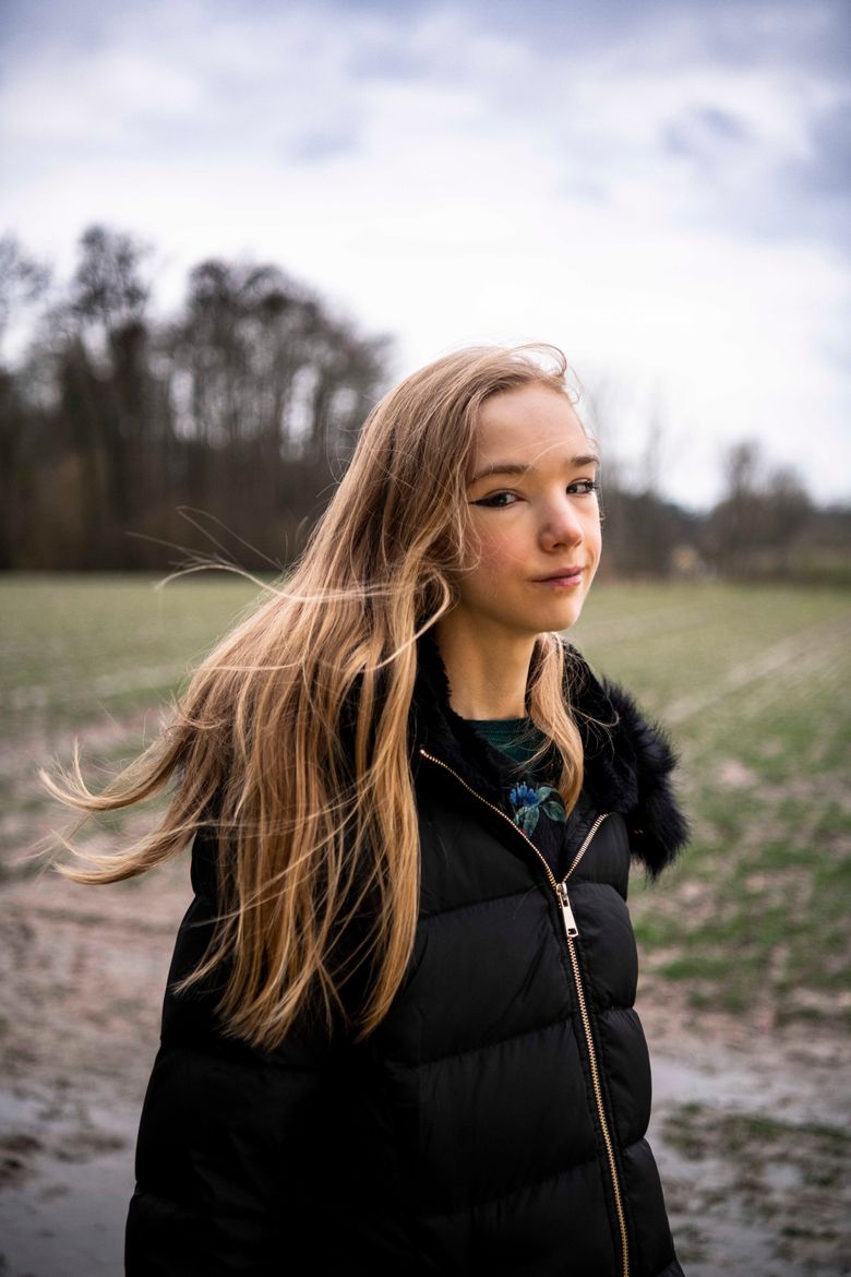 Naomi Seibt poses for a portrait near her home in Munster, Germany. Seibt, 19, uses YouTube to denounce “climate alarmism,” countering the arguments of young climate activist Greta Thunberg. (Photo for The Washington Post by Sebastien Van Malleghem).