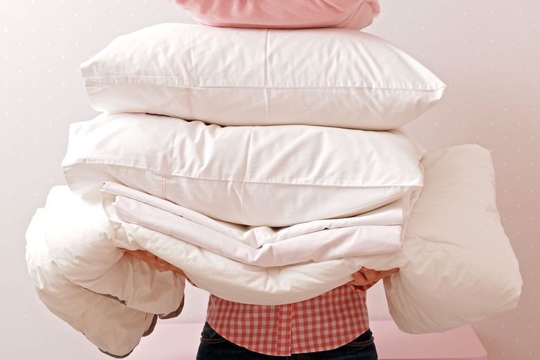 How To Wash Your Down Coats And Duvets Before Storing Them The