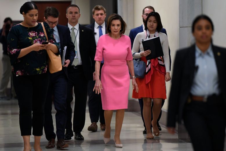 House Speaker Nancy Pelosi of Calif., heads to a news conference on Capitol Hill in Washington, Thursday, March 26, 2020. (AP Photo/Susan Walsh) 
