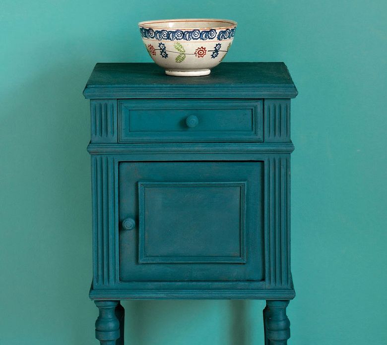 Annie Sloan’s Chalk Paint in Aubusson Blue is shown on a side table. (Courtesy of anniesloan.com)