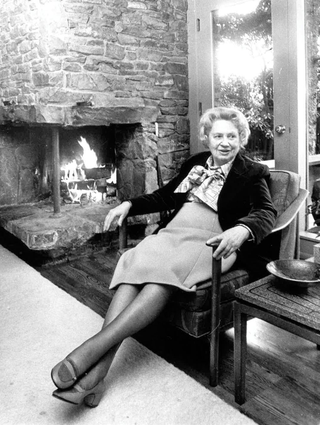 Hope Foote relaxes in the Windermere home she designed for herself in 1951. (MOHAI, Seattle Post-Intelligencer Collection, 2000.107.067.43.01)