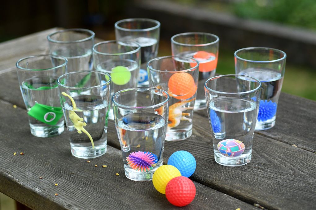 Set up a fish bowl game without real fish. Instead, toss lightweight balls into drinking glasses containing plastic animals and trinkets. (JiaYing Grygiel)