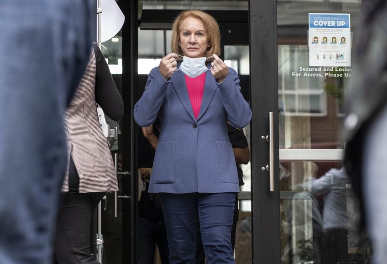 Mayor Jenny Durkan prepares to address demonstrators in Seattle in June. She is expected to hire a COVID-19 recovery director “in the coming months,” according to a spokesperson. (Dean Rutz / The Seattle Times)