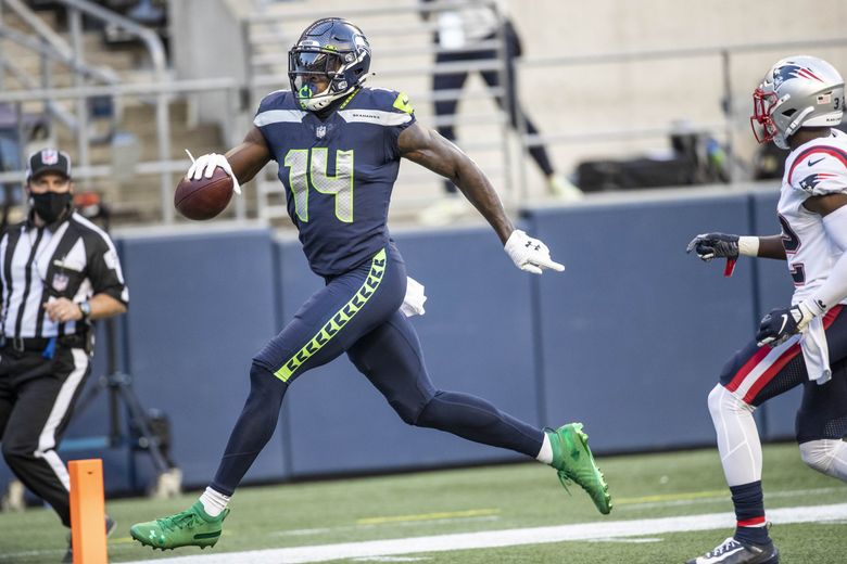 DK Metcalf pulls in a 54-yard touchdown pass from Russell Wilson in the 2nd quarter. The New England Patriots played the Seattle Seahawks in NFL action Sunday, September 20, 2020 at CenturyLink Field in Seattle, WA. (Dean Rutz / The Seattle Times)