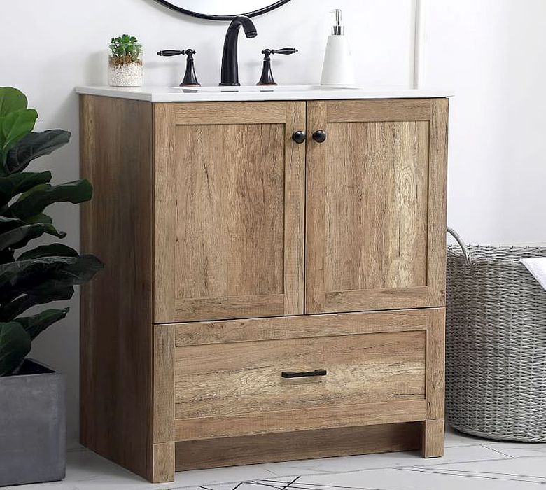 An oak, shaker-style vanity, such as Pottery Barn’s Natural Oak Alderson Single Sink Vanity, is a classic style. (Courtesy of Pottery Barn)