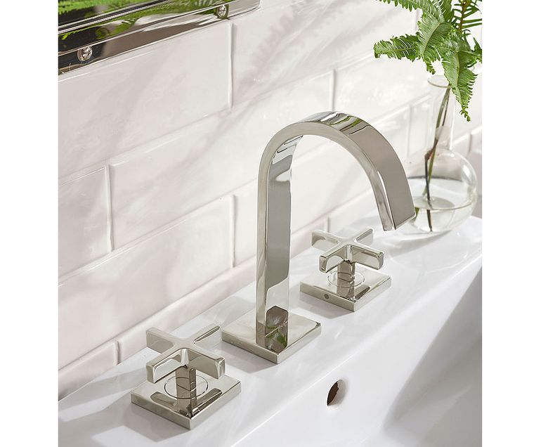 Polished chrome is a classic finish that can be mixed with other materials. Here, it’s show on Rejuvenation’s Yaquina Cross Handle Widespread Bathroom Faucet. (Courtesy of Rejuvenation)