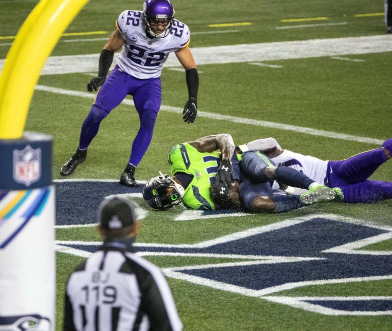 DK Metcalf makes the game-winning catch against Minnesota.  The Minnesota Vikings played the Seattle Seahawks in NFL Football Sunday, October 11, 2020 at CenturyLink Field in Seattle, WA. 215299 (Dean Rutz / The Seattle Times)