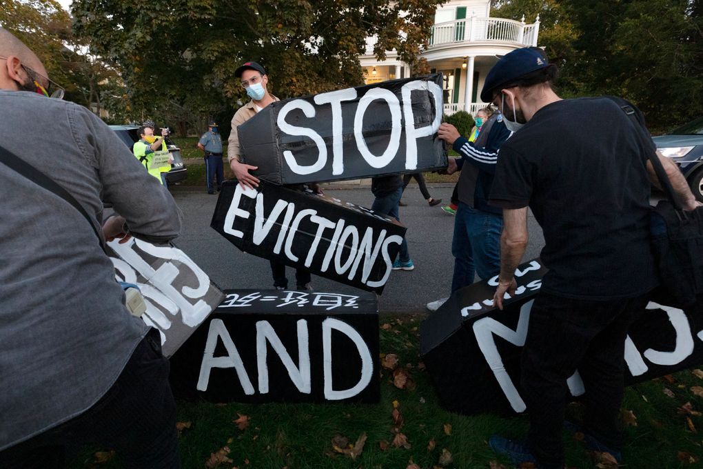 FILE – Housing activists erect a sign in front of Massachusetts Gov. Charlie Baker’s house, Wednesday, Oct. 14, 2020, in Swampscott, Mass. Renters are still being evicted during the coronavirus pandemic despite a federal order that is supposed to keep them in their homes. The nationwide eviction ban went into effect Sept. 4 and was supposed to replace many state and local bans that had expired. But tenant advocates said there are still people unaware of the directive implemented by the Centers for Disease Control and Prevention that broadly prevents evictions for nonpayment of rent through the end of 2020. (AP Photo/Michael Dwyer, file)