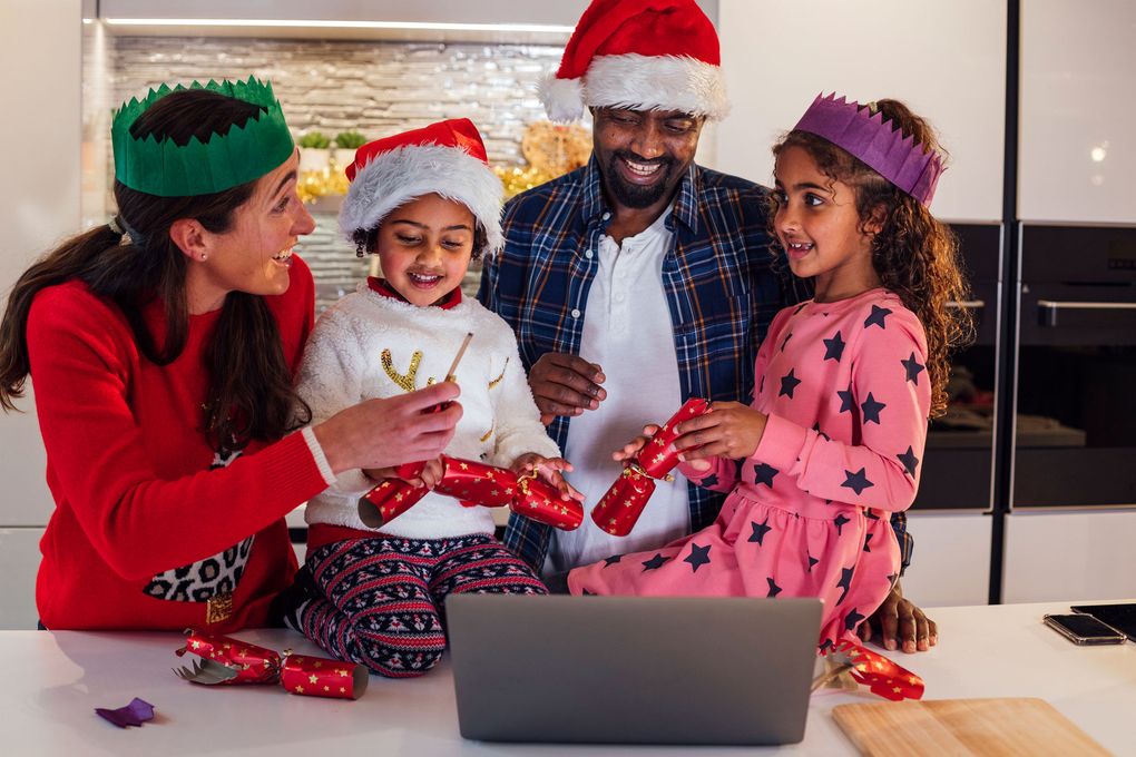 Enhance a video call with loved ones by sending care boxes containing things like hats and small gifts that can be opened together. (iStock)