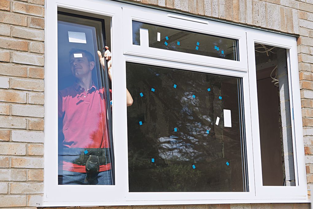 Replacing windows is one way to create a new look for a home’s exterior. It also improves the home’s energy efficiency and reduces noise from outside. (Getty Images)