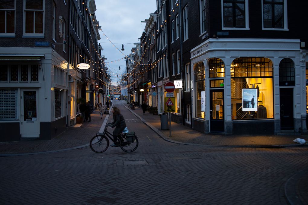 The capital’s popular Nine Streets shopping area is near-deserted during lockdown in Amsterdam, Thursday, Jan. 14, 2021. The Dutch government this week extended by three weeks the tough lockdown in force since mid-December amid fears that coronavirus infection rates are not declining quickly enough and fears about a new more transmissible variant of the virus. (AP Photo/Peter Dejong)