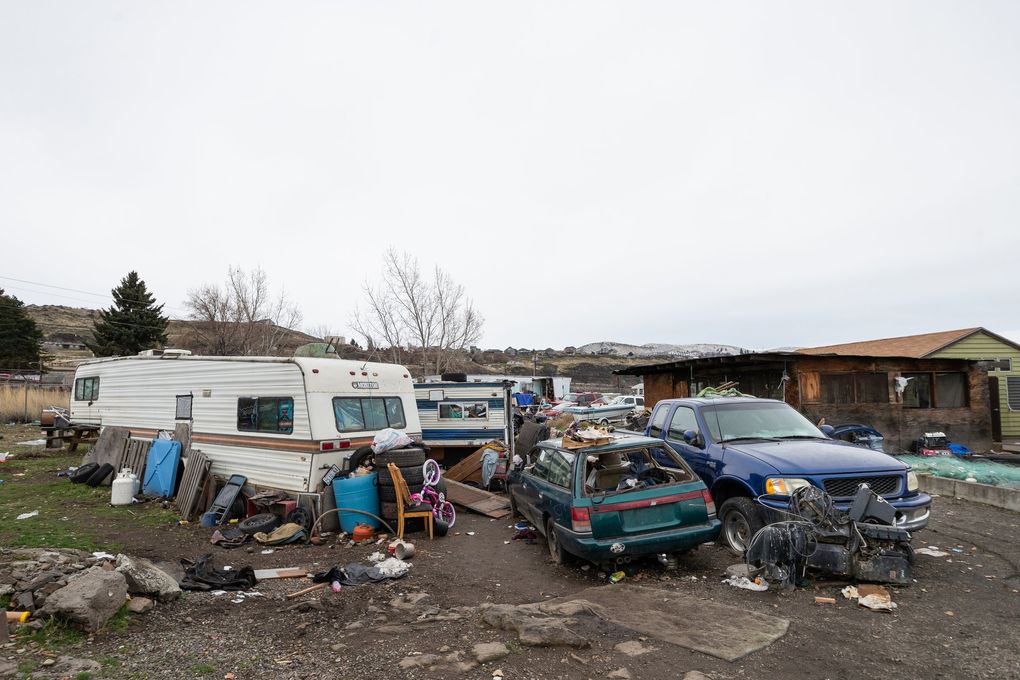Trailer houses and belongings sit at the Lone Pine In-Lieu Fishing Site near The Dalles Dam in the Columbia River Gorge. The coronavirus pandemic has brought increased pressure to the health and living conditions of the Native Americans living at the site. (Andy Bao)