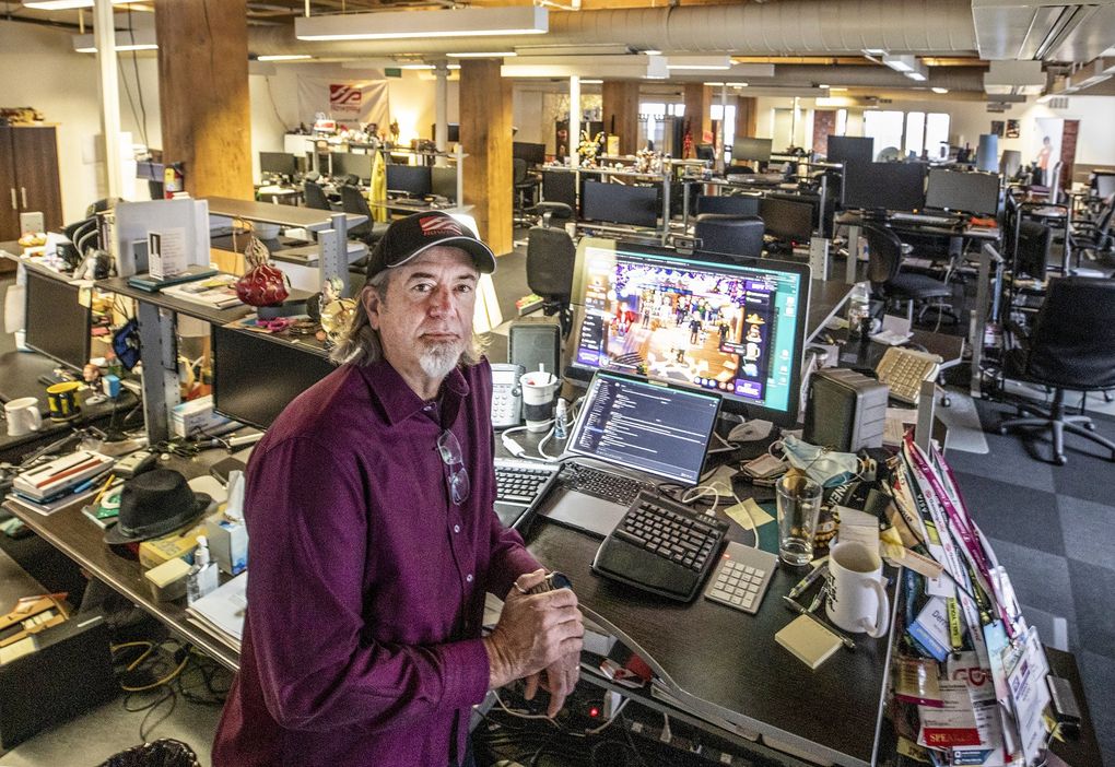Derrick Morton, CEO of Seattle gaming company FlowPlay, says more than half of his 61 workers will keep working from home. The company is considering subleasing half its office space. (Steve Ringman / The Seattle Times)